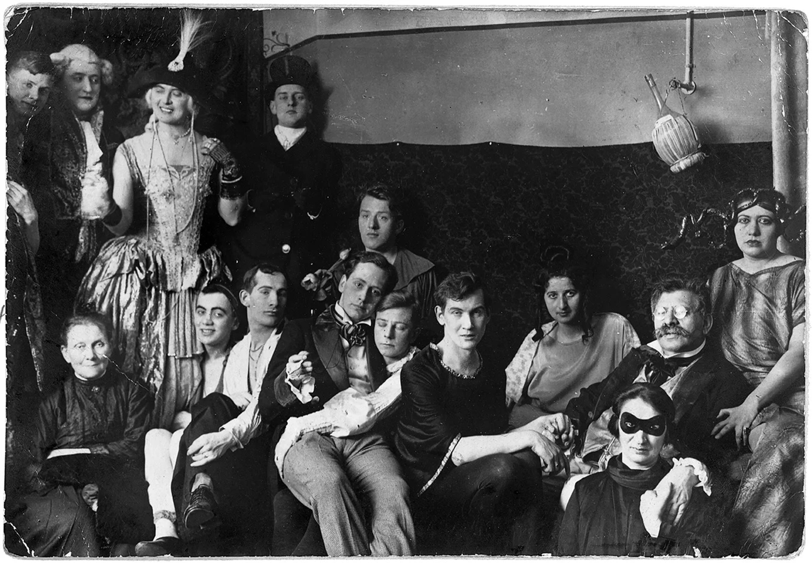 Magnus Hirschfeld (right with glasses) at a costume party at his Institute for Sexual Science