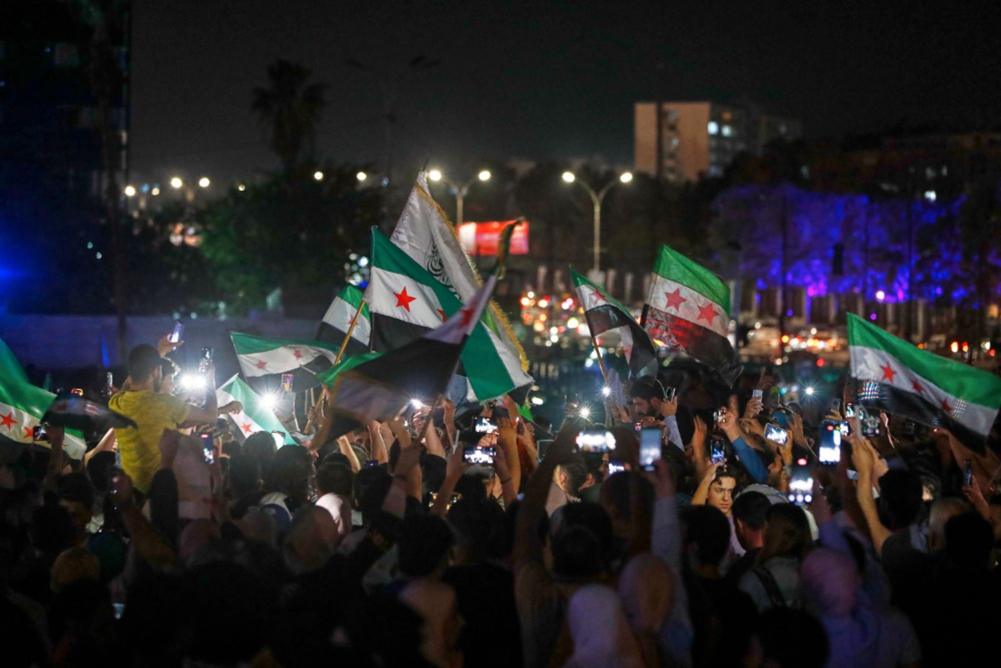 Syrians in Damascus celebrate the U.S. decision to lift sanctions.