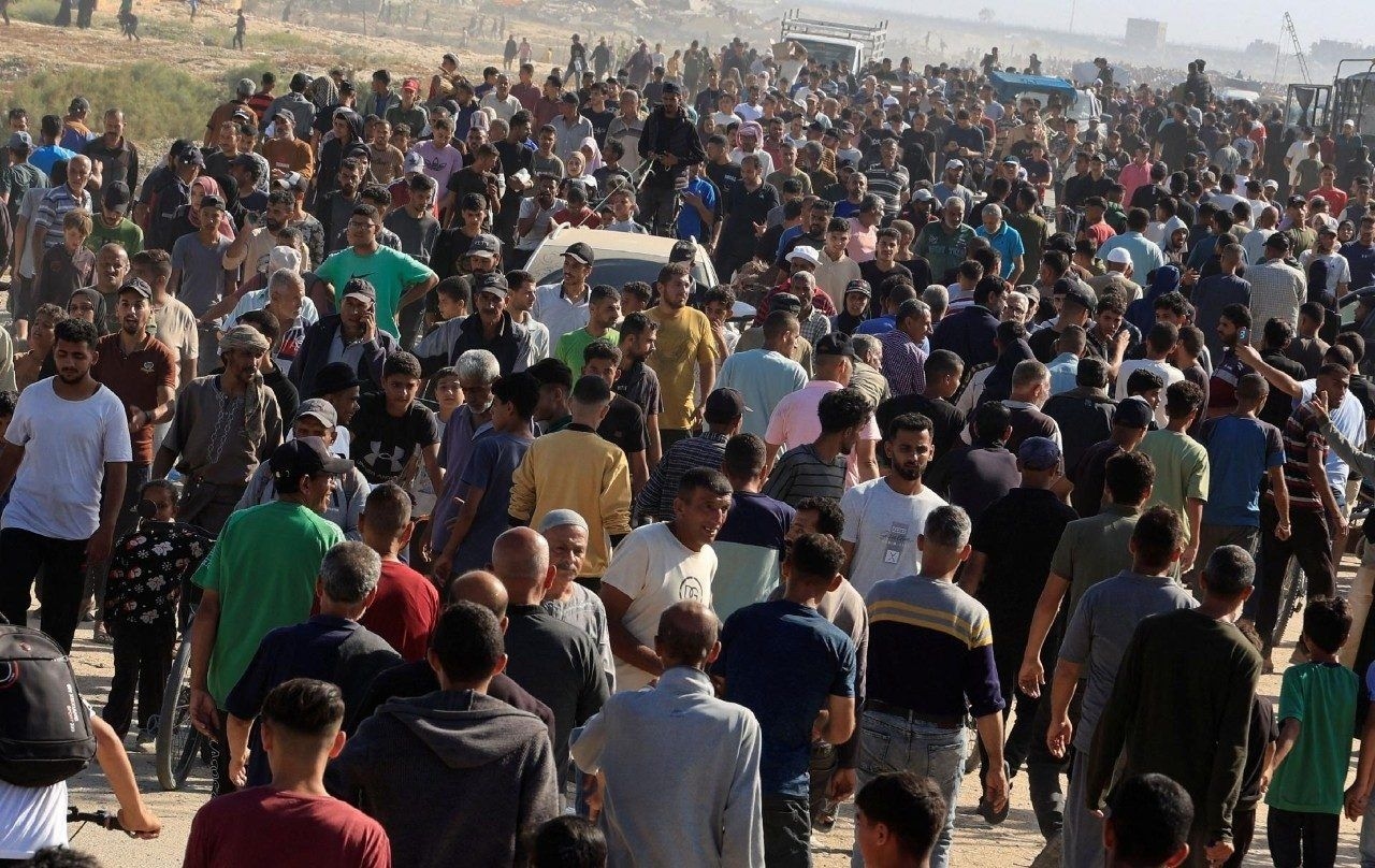 Palestinians at a humanitarian aid distribution point in Rafah
