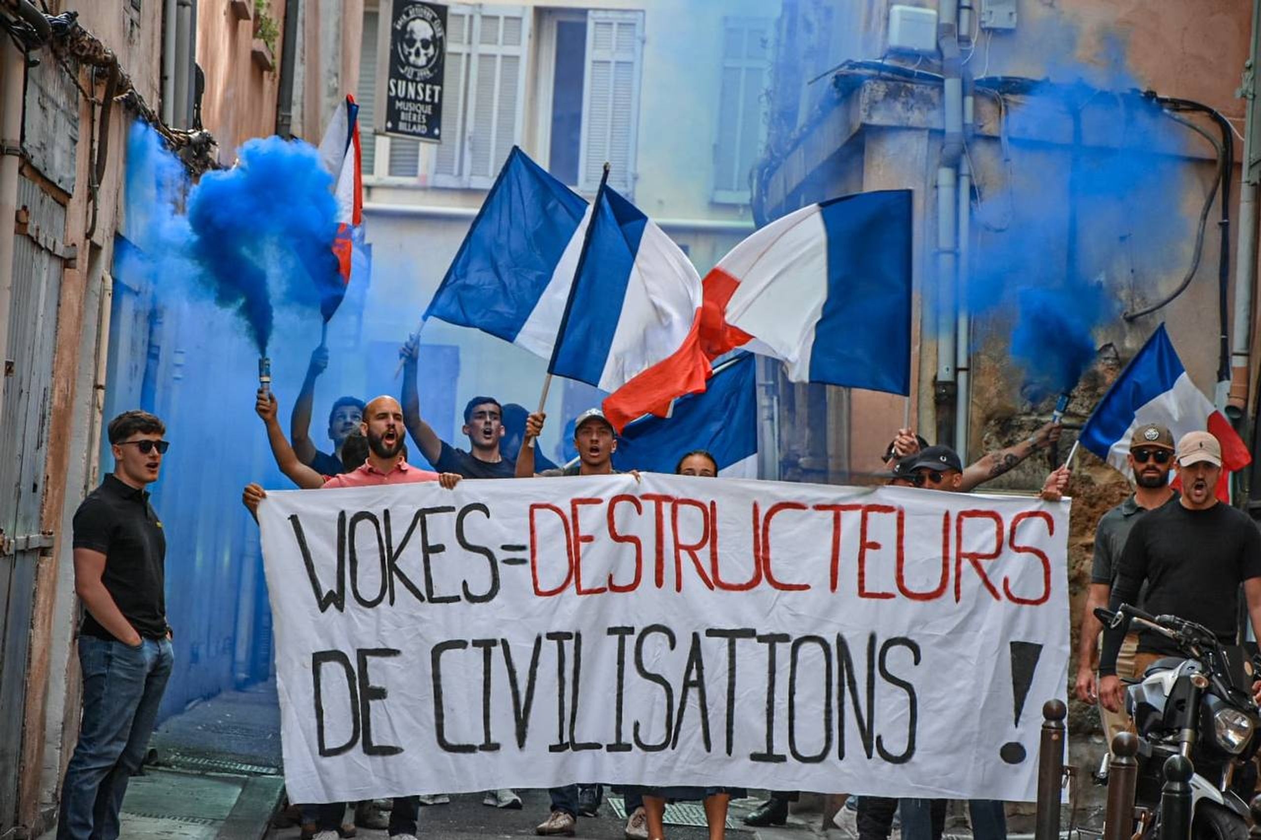 French far-right supporters protesting "woke culture"