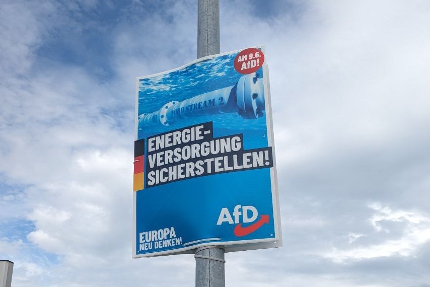 An election poster of Alternative for Germany (AfD) featuring the Russian gas pipeline Nord Stream 2. Photo: The Insider