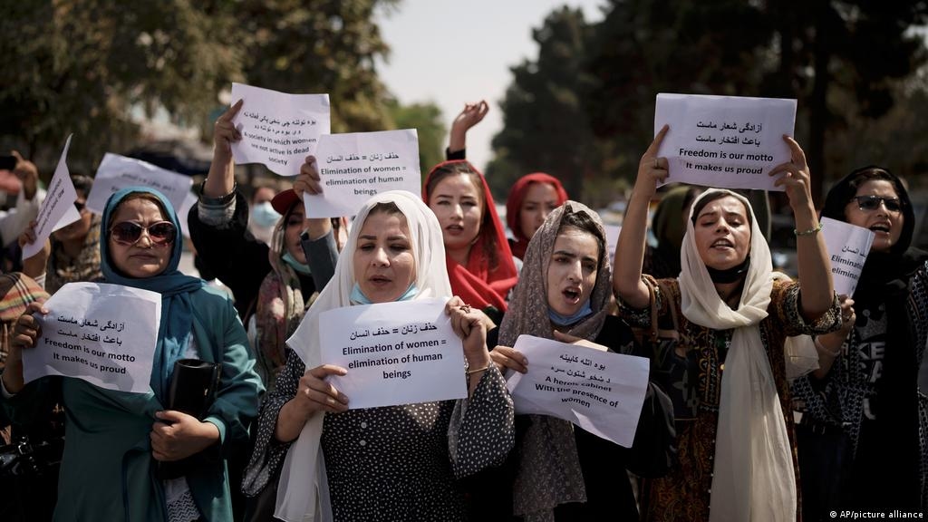 Women gather to demand their rights under the Taliban rule during a protest in Kabul, Afghanistan