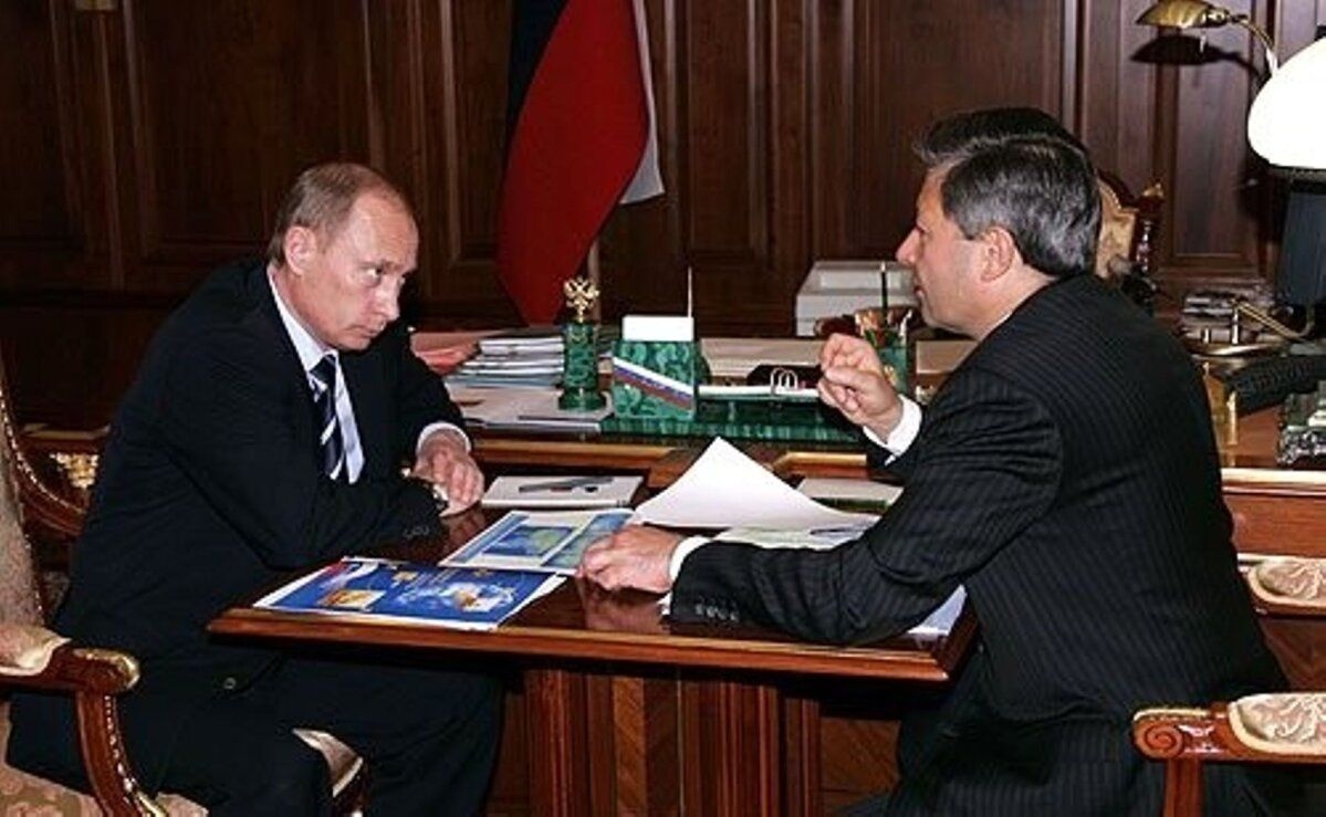 Vladimir Putin and Leonid Reiman