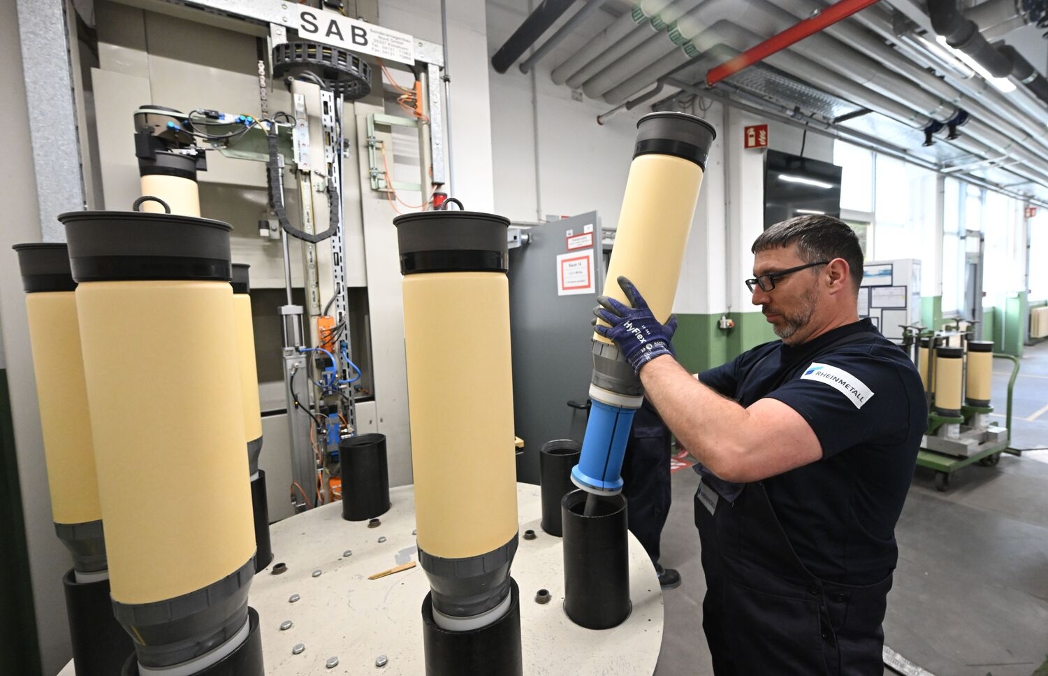 A Rheinmetall employee at an ammunition production facility in the large-caliber weapons division