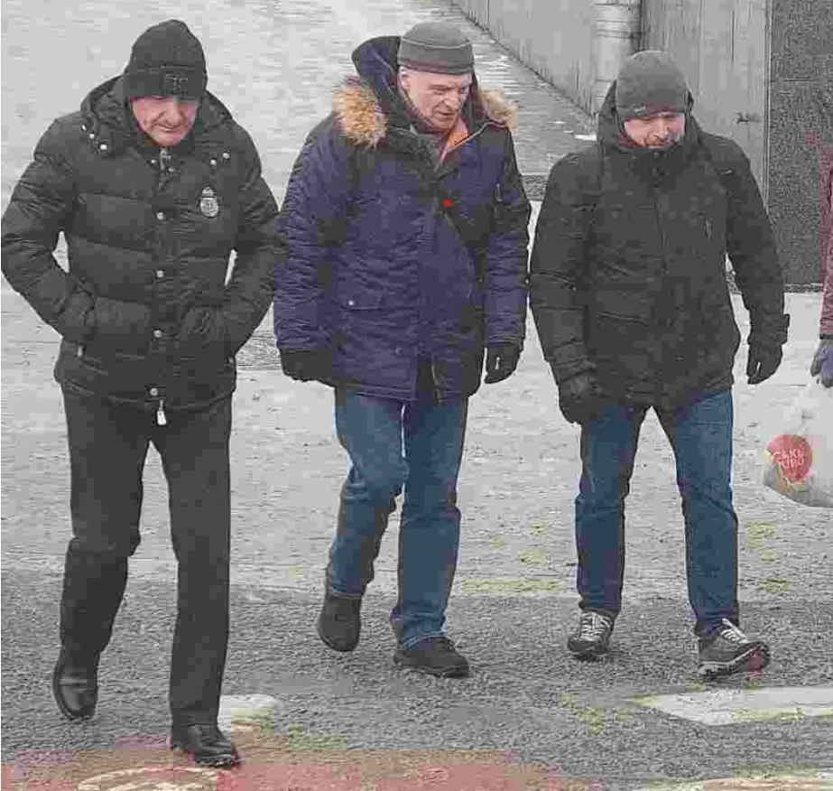 Denis Smolyaninov (right) with knife-throwing coach Vladimir Trofimov (left) and arms dealer Andrei Usachev (center)