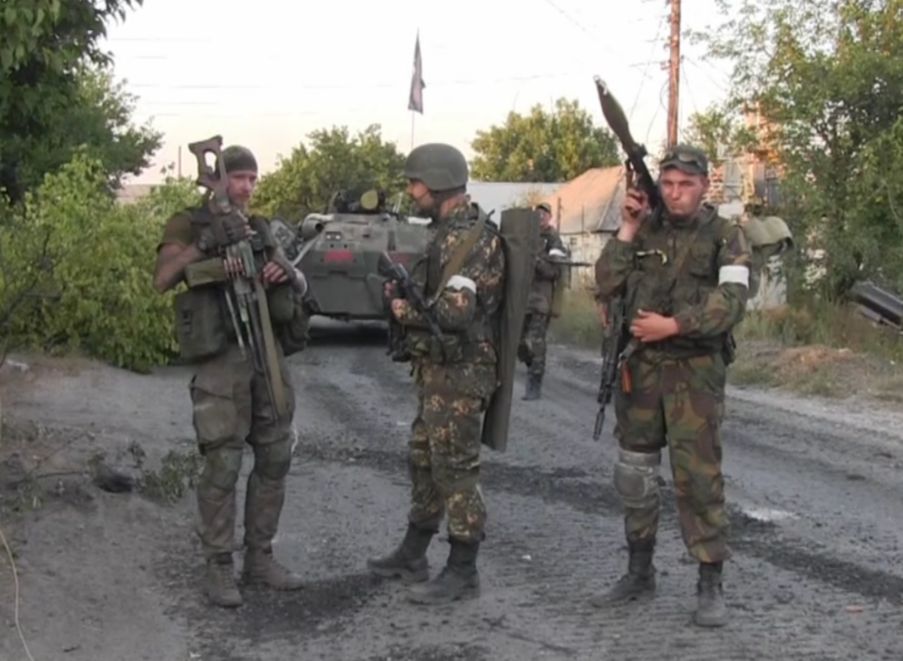 From left to right: Aleksandr "Harry" Dergachov (Rusich group grenadier), Motorola, and Yan Petrovsky